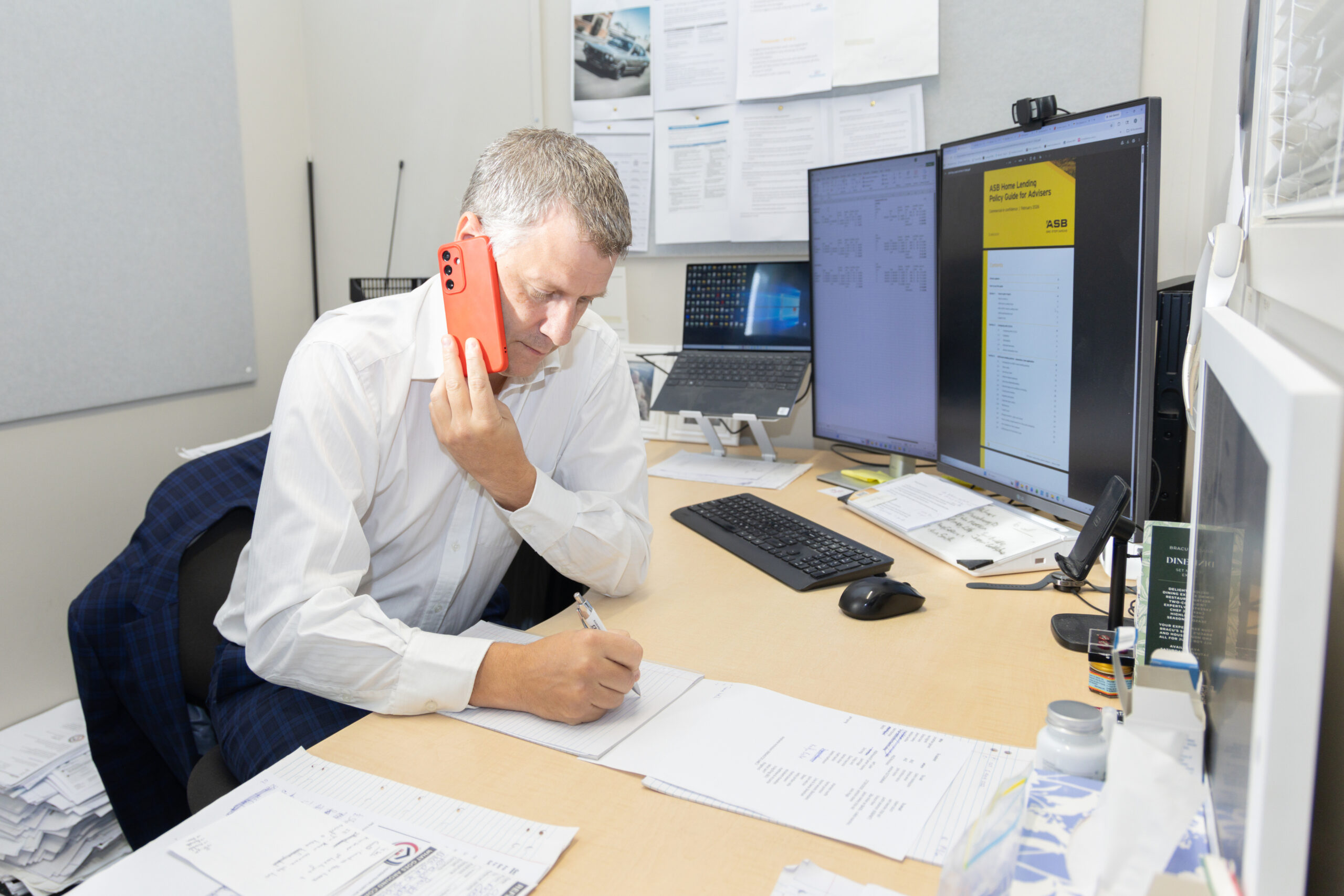 Man in a suit on the phone