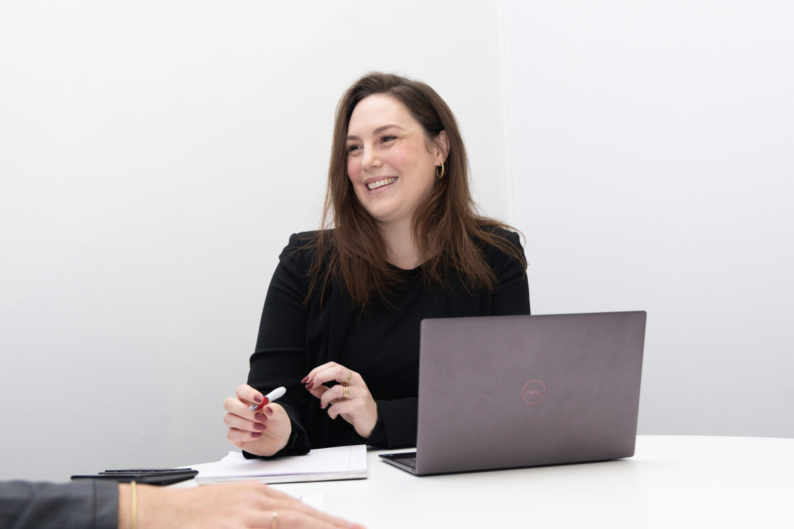 Woman smiling in an office setting